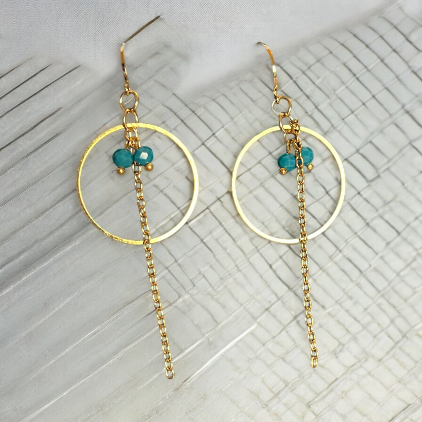 Boucles d'oreilles avec perles bleues